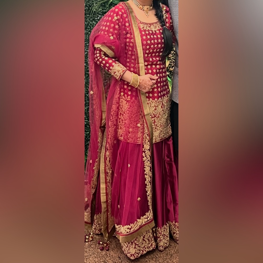 Embroidered Indian lehenga in purple pinkish tone